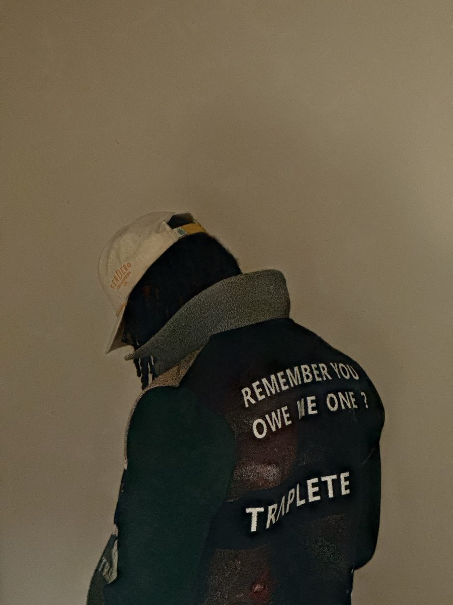 Cortez Devinci from behind in a Sendero cap, face turned away